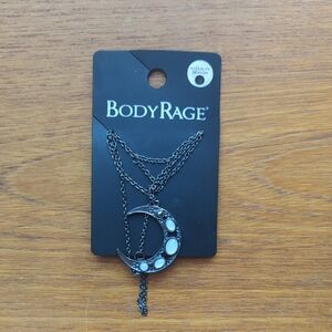 Spencer's Body Rage Crescent Moon Necklace. NWT.